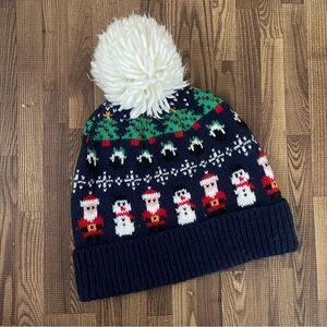 Atmosphere Pom Christmas Beanie with Santa, snowmen, snowflakes and trees Adult